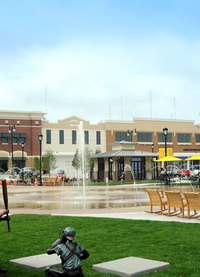 Downtown Frisco Square at night with Christmas lights and decorations